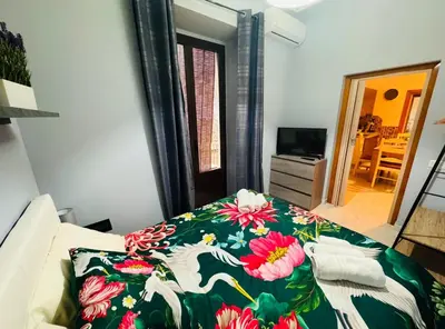 Letto o letti in una camera di Caronda Etnea House