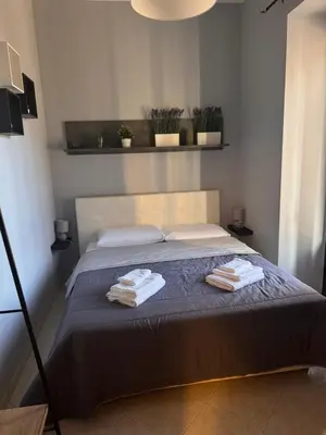 Letto o letti in una camera di Caronda Etnea House