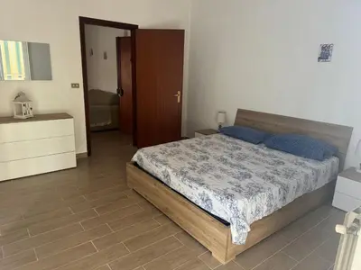 Letto o letti in una camera di Casa Sole Sofiè