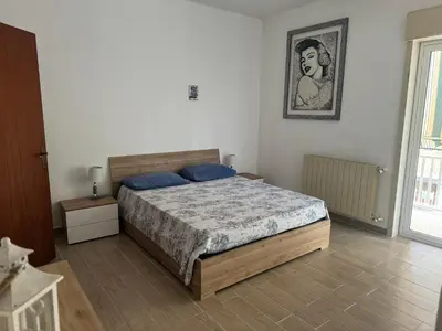 Letto o letti in una camera di Casa Sole Sofiè