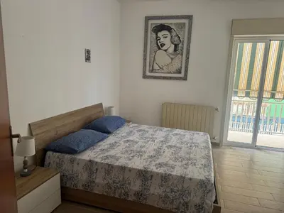 Letto o letti in una camera di Casa Sole Sofiè