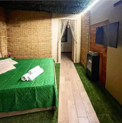 Letto o letti in una camera di Cerami Jungle Suite