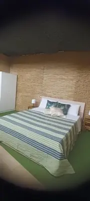 Letto o letti in una camera di Cerami Jungle Suite