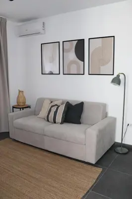 Area soggiorno di Andronico House