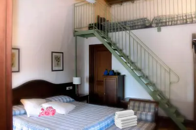 Letto o letti in una camera di Le Case Del Merlo Turismo Rurale
