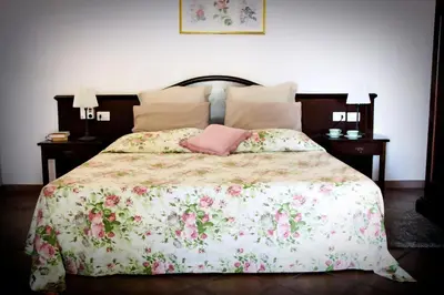 Letto o letti in una camera di Le Case Del Merlo Turismo Rurale
