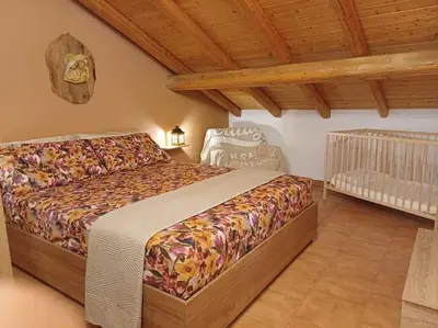Letto o letti in una camera di Cocò House, mansarda vista mare