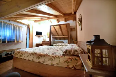 Letto o letti in una camera di Cocò House, mansarda vista mare