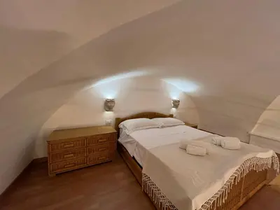 Letto o letti in una camera di Il Cortiletto