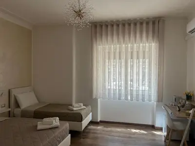 Letto o letti in una camera di EFFE Home