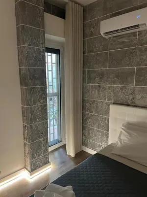 Letto o letti in una camera di EFFE Home