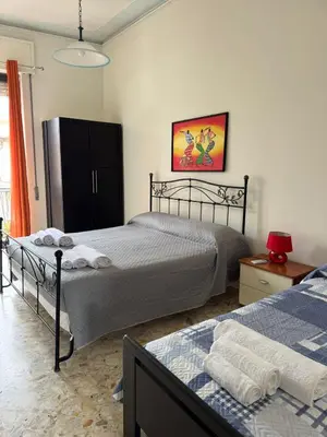 Letto o letti in una camera di Jonia Apartments