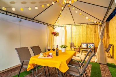 Area soggiorno di MELA your home between Sea and Etna