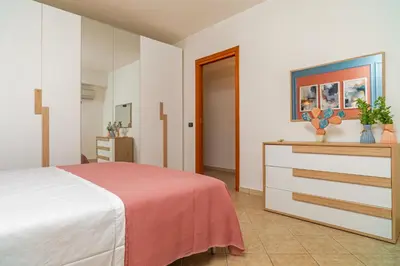 Letto o letti in una camera di MELA your home between Sea and Etna