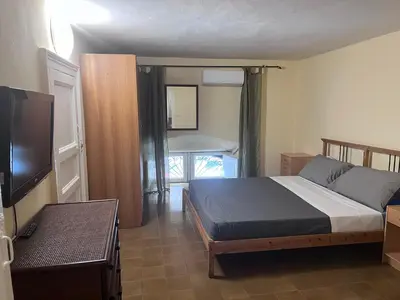 Letto o letti in una camera di Casa Catania Center
