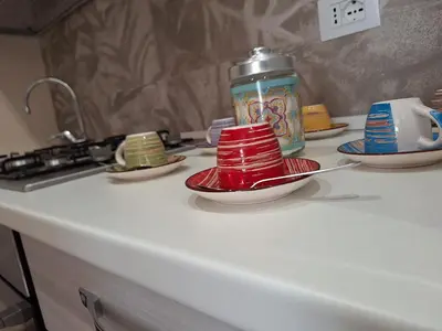 Cucina o angolo cottura di B&B Onda Marina Villa Bellini Catania Centro