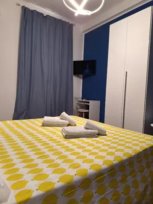 Letto o letti in una camera di B&B Onda Marina Villa Bellini Catania Centro