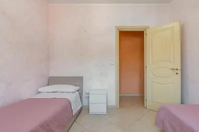 Letto o letti in una camera di GuestHost - Apartment with Terrace in Aci Catena