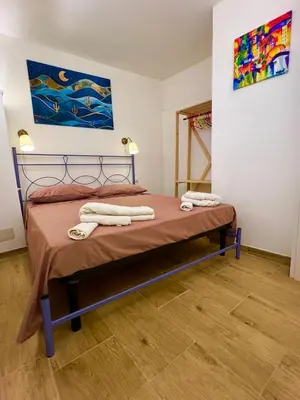 Letto o letti in una camera di Sweet Home Catania historic center