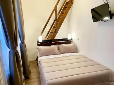Letto o letti in una camera di Sebastian's Elegant Apartment