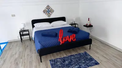 Letto o letti in una camera di Blu Home