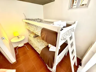 Letto o letti in una camera di Marilù e il Mare - Your home by the sea