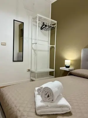 Letto o letti in una camera di Casa vacanze I Mori - Elegante,centrale,spaziosa