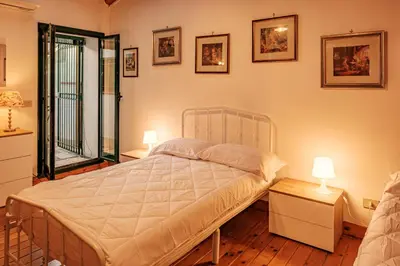 Letto o letti in una camera di La campagna e il mare
