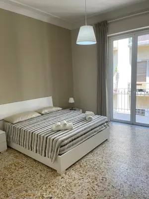 Letto o letti in una camera di Gorizia Home