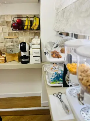 Cucina o angolo cottura di Clemente House Catania Centro MERAVIGLIOSA camera matrimoniale