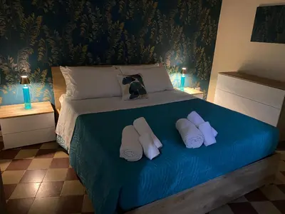 Letto o letti in una camera di Il palazzo Dei Normanni