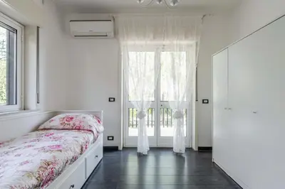 Letto o letti in una camera di GuestHost - Spacious Coastal Flat in Aci Castello