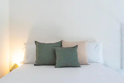 Letto o letti in una camera di Giardino degli Avocadi