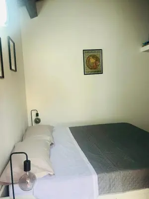 Letto o letti in una camera di CasAurora