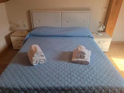 Letto o letti in una camera di A Casitta