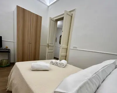 Letto o letti in una camera di La Dimora Etnea G&D