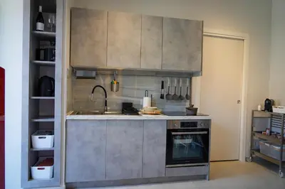 Cucina o angolo cottura di R-HOME Acicastello