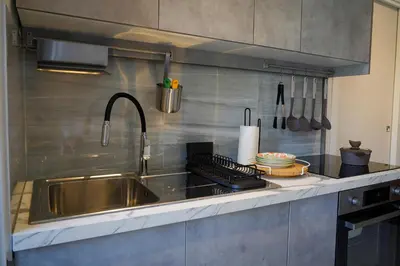 Cucina o angolo cottura di R-HOME Acicastello