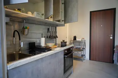Cucina o angolo cottura di R-HOME Acicastello