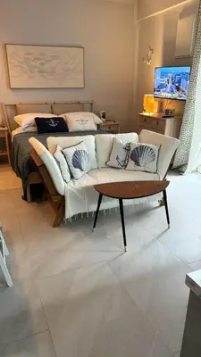 Letto o letti in una camera di R-HOME Acicastello