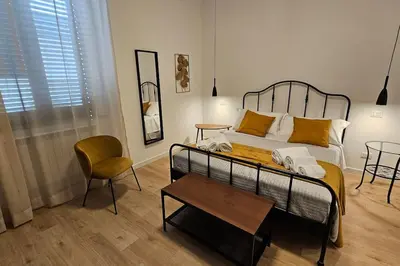 Letto o letti in una camera di Macchi Catania centro Apartment