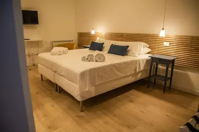 Letto o letti in una camera di Macchi Catania centro Apartment