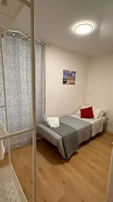 Letto o letti in una camera di Macchi Catania centro Apartment