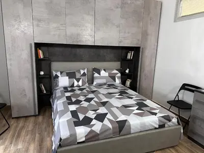 Letto o letti in una camera di Room Chiarina