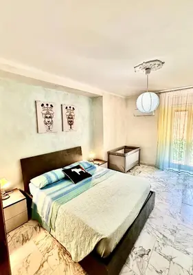 Letto o letti in una camera di L'angelo di casa mia