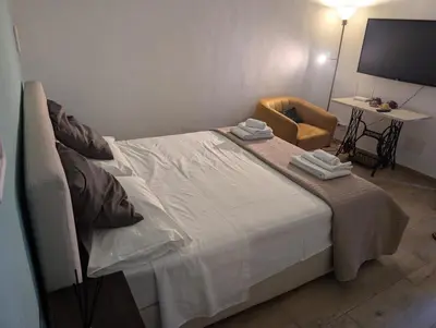 Letto o letti in una camera di N amuri room a due passi del mare