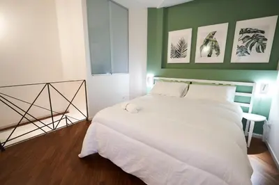 Letto o letti in una camera di Via Cagliari Home