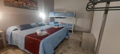 Letto o letti in una camera di Debora Holiday House
