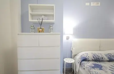 Letto o letti in una camera di La Dimora di Lella