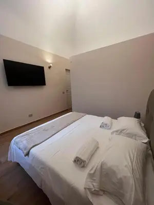 Letto o letti in una camera di Domus Catania Centro
